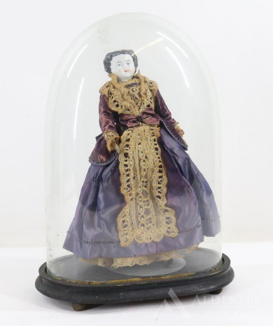 LOT OF CHINA DOLLS.: Lot. 12" Doll (mark illegible) with black flat top style hair, blue eyes. Original cloth body with wooden lower limbs. Cup style hands (thumb missing right hand). Legs have painted black boots, white 