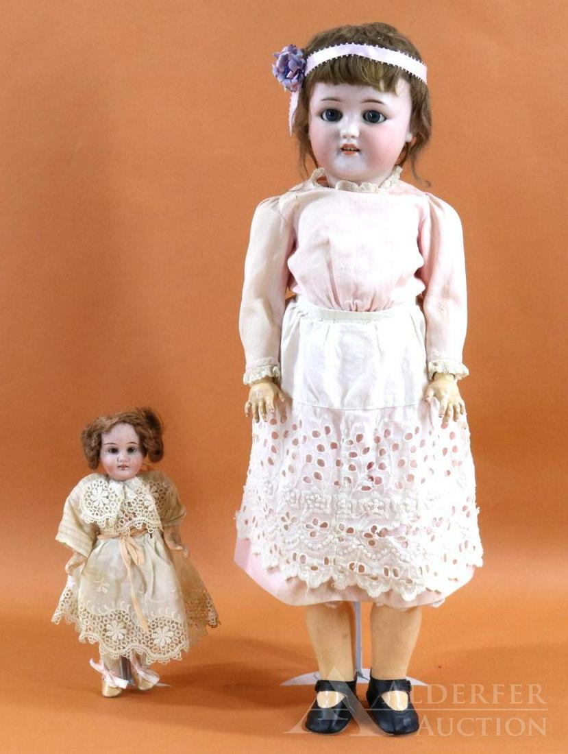 ANTIQUE BISQUE HEAD DOLL(S). (1 of 9)