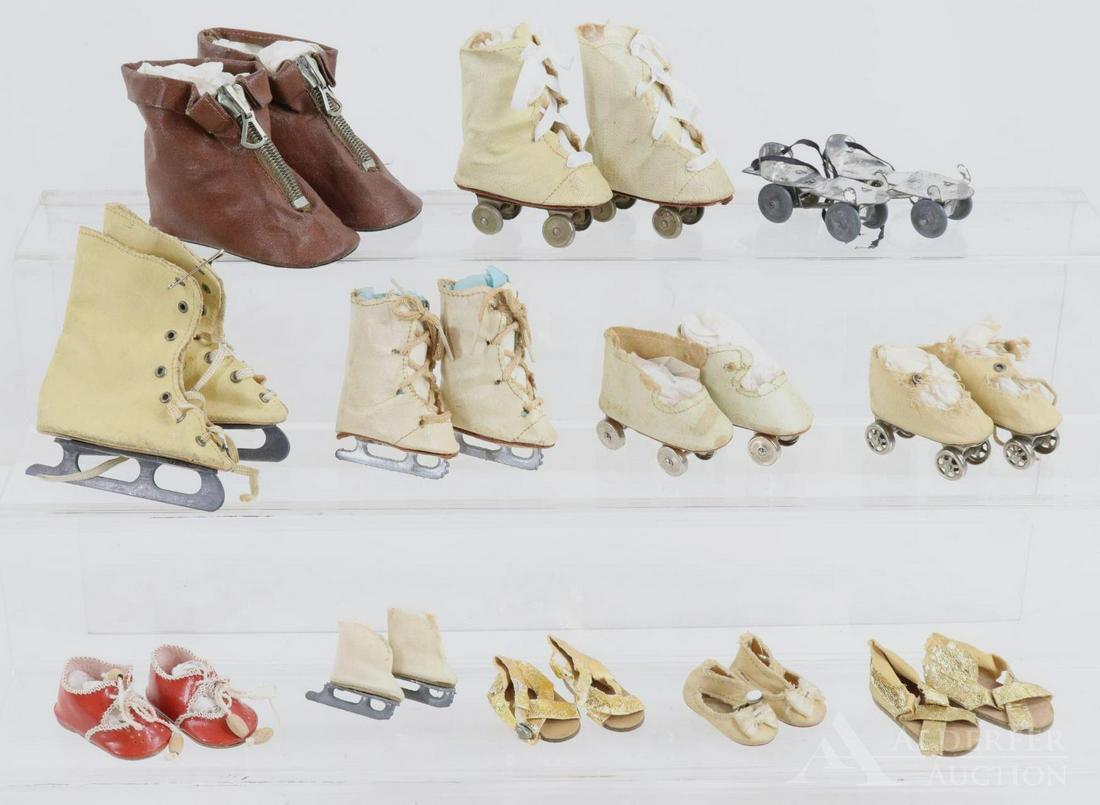 LOT OF ANTIQUE/VINTAGE ACCESSORIES.: Lot of antique/vintage doll skates, shoes, boots. (2) Prs. high top ice skates and (1) pr. Ginny/Alex ice skate boots. (2) Prs. shoe roller skates, (1) pr. high top roller skates. (1) Pr. metal clamp