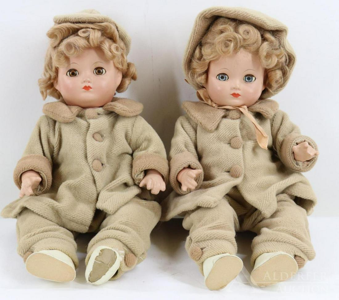 LOT OF COMPOSITION.: Pair of 1940's 14" all original Effanbee twin "Mickie & Janie" dolls with sleep eyes, closed mouths, curly honey blonde mohair wigs. Cloth bodies with composition arms and lower legs. Dressed in origi