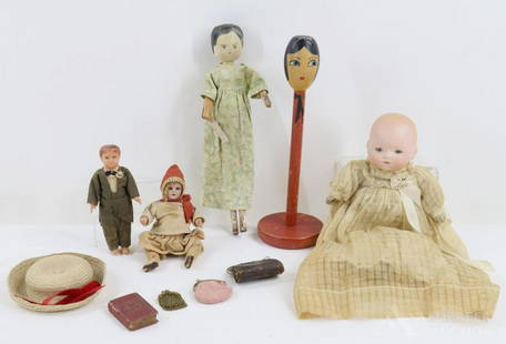 LOT OF HOLIDAY/NOVELTY.: Lot. 11" Wooden hat stand with painted head/face on top. 11" Peg wooden doll (arm has come off doll). 5 1/2" Male celluloid doll. 6" Bisque head sitting doll (that looks as though it came off of a