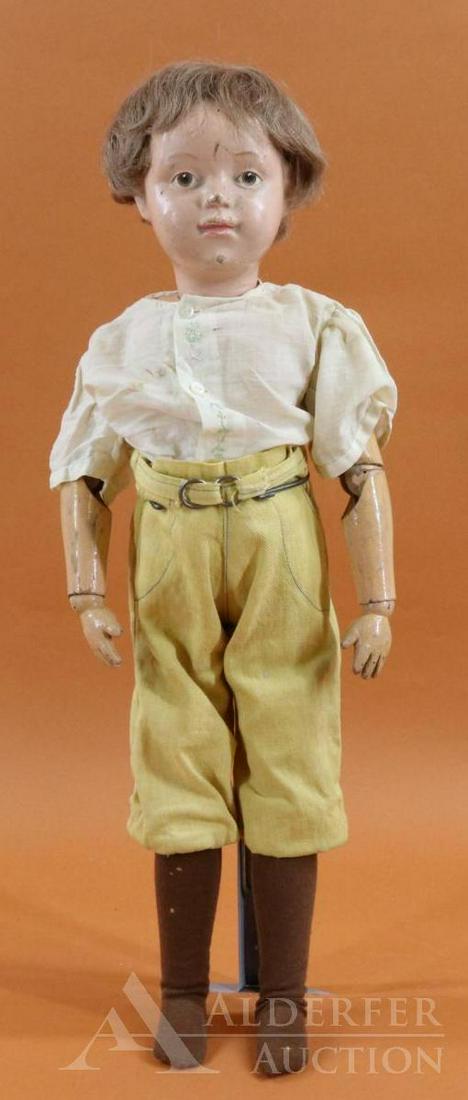 LOT OF SCHOENHUT.: 21" Model No. 405 with brown human hair wig, brown intaglio eyes. Mark: incised on back of torso. No original clothing, shoes. Dressed in vintage shirt, pants. Condition: no repaint visible on face (p