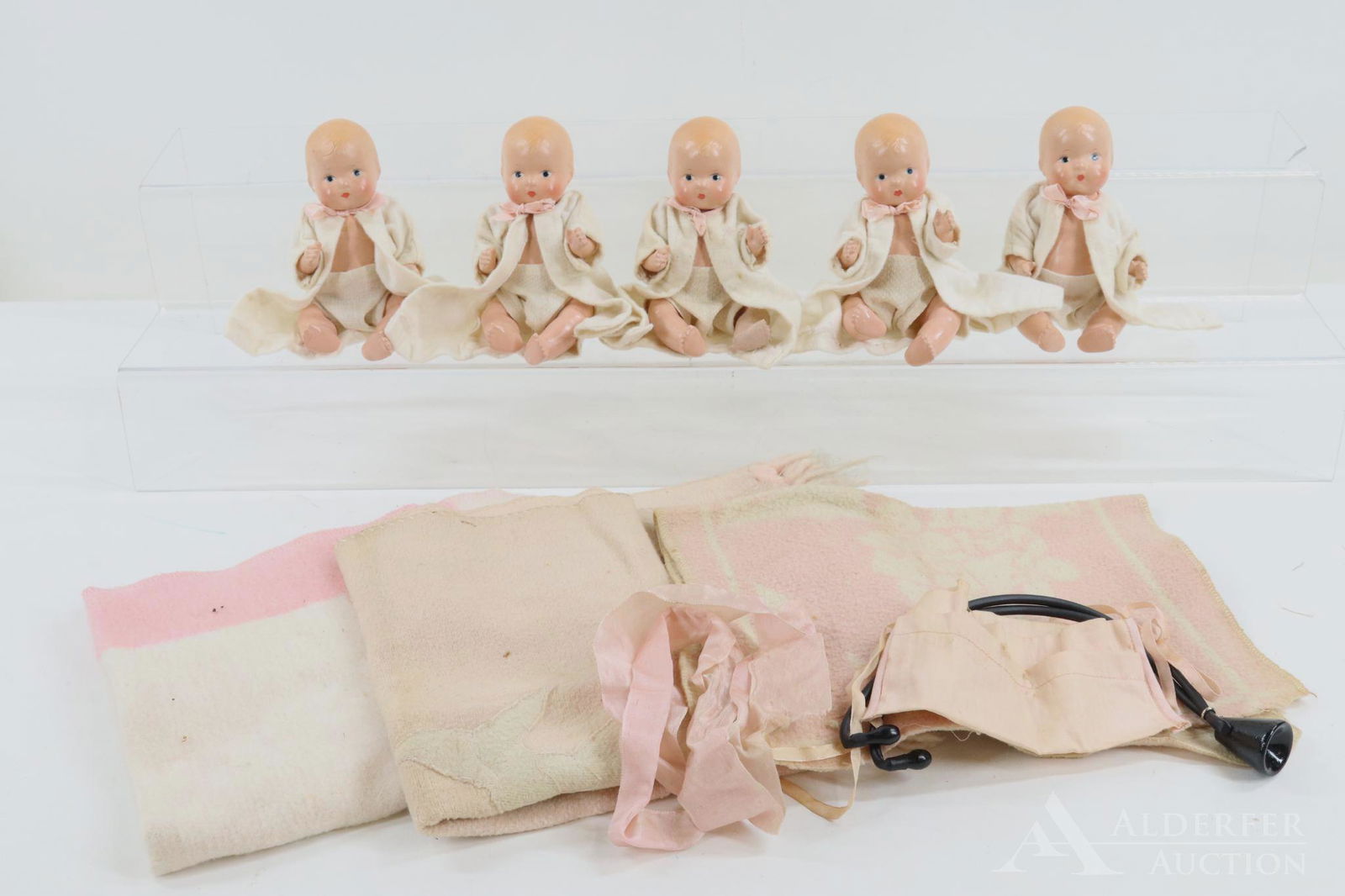 LOT OF COMPOSITION DOLLS.: Set of (5) 7" EFFANBEE "Baby Tinyette Quintuplet" dolls. All of the dolls have painted blue eyes and blonde hair, closed mouths. 5 Pc. baby bodies with swivel necks. Dressed identically in flannel rob