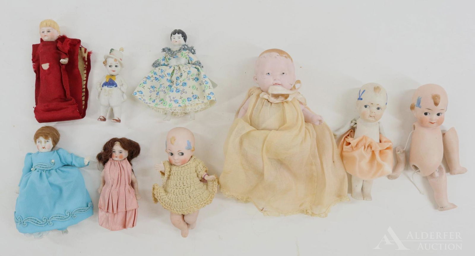 LOT OF ALL BISQUE DOLLS. (1 of 5)