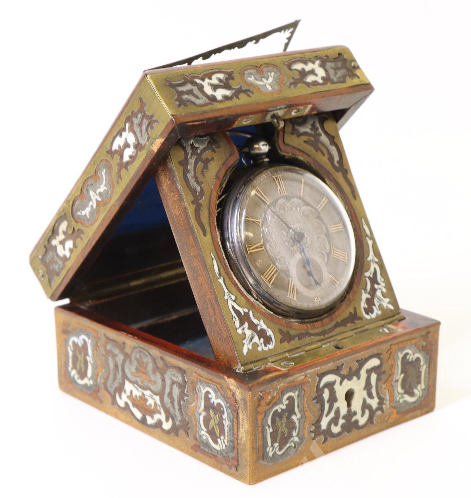 British Sterling Silver 1864 Pocket Watch: Case marked Thomas Holliday, London 1863. With marquetry watch holder, mixed metals and woods with bone. The brass border on case lifting in areas. Box 2"h x 3.25"w x 4"d