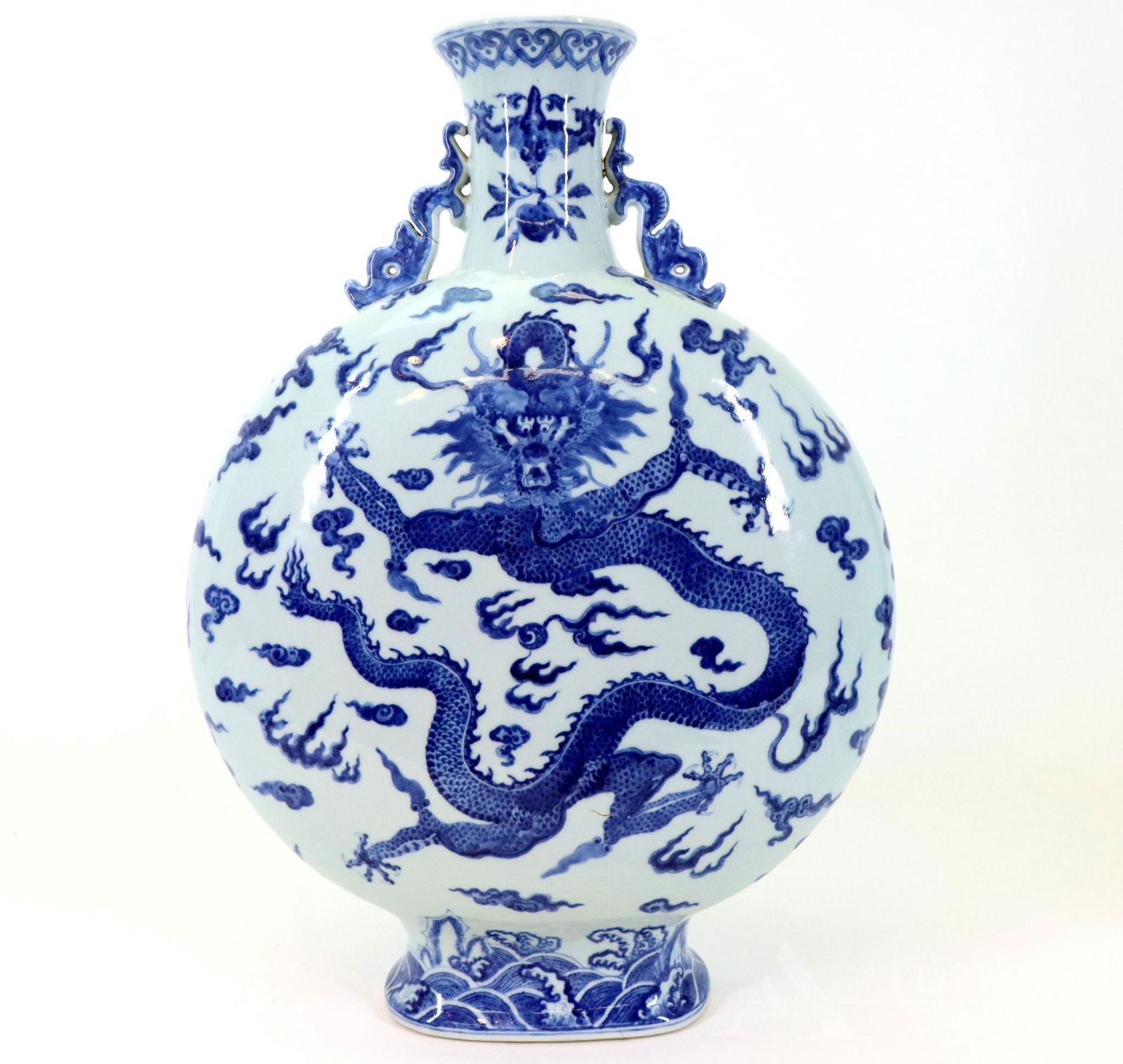 Ming-Style Blue and White Moon Flask: Five-clawed dragon shown full-face, circling a flaming pearl with clouds and flames set upon a base with rolling waves. Tapering cylindrical neck decorated with a bat and applied scroll handles. Qianl