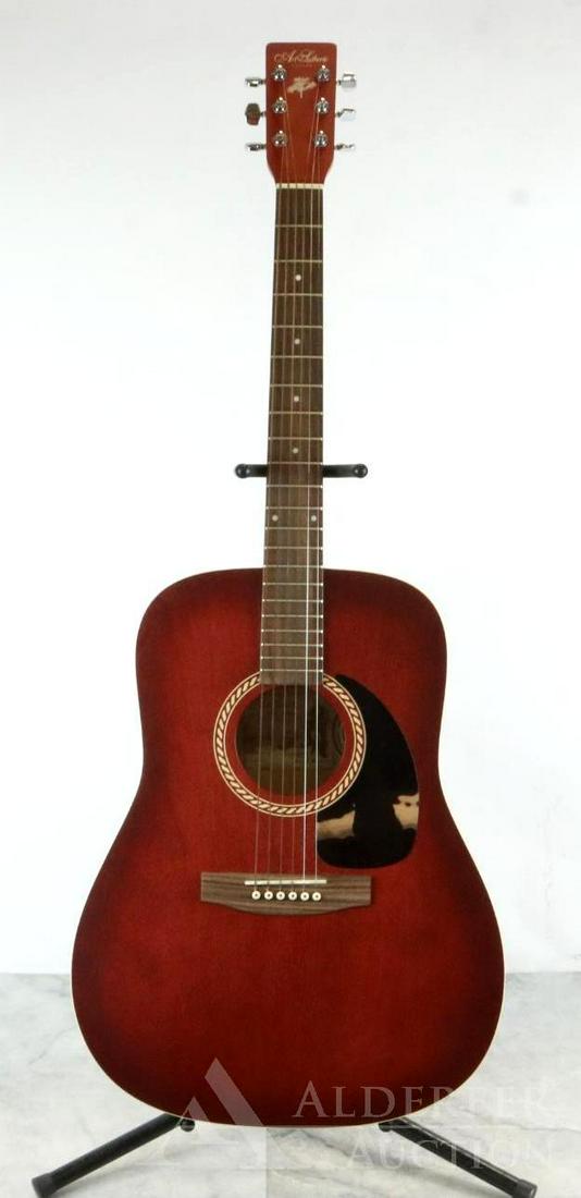 Art and Lutherie Acoustic Guitar: "Wild Cherry" acoustic guitar. Made in Canada. Good condition. Includes bag, strap and tuner. This item is NOT eligible for in-house shipping. Please refer to auction terms. Please contact a 3rd par