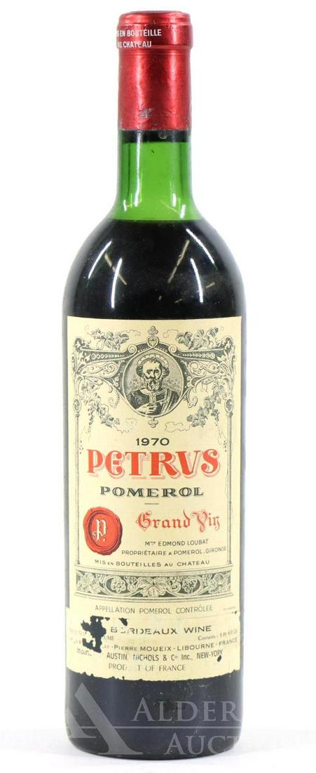 Petrus Pomerol Grand Vin Wine 1970 (1): Petrus Pomerol Grand Vin, 1970. (1) bottle of wine at 750 ml. Below the neck fill. This item is not available for shipping, pick up only.