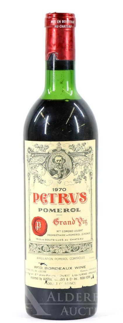 Petrus Pomerol Grand Vin Wine 1970 (1): Petrus Pomerol Grand Vin, 1970. (1) bottle of wine at 750 ml. Below the neck fill. This item is not available for shipping, pick up only.