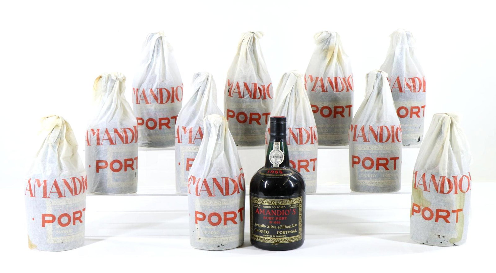 Amandio's Ruby Port Wine, 1955 Portugal (12): Amandio's Ruby Port Wine, 1955 Portugal. Full Case in original box, (12) bottles at 750 ml. This item is not available for shipping, pick up only.