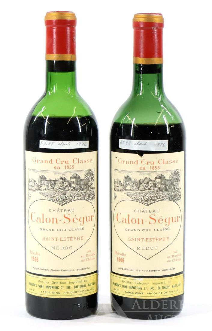 Calon-Segur Grand Cru Classe 1966 Wine and Saint: Calon-Segur Grand Cru Classe 1966 and Saint Estephe Medoc. (2) bottles of wine at 750 ml. Mid-upper shoulder fill; recessed cork. This item is not available for shipping, pick up only.