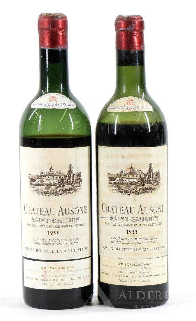 Chateau Ausone Saint-Emilion Mis En Bouteilles Au: Chateau Ausone Saint-Emilion Mis En Bouteilles Au Chateau, 1955. (2) bottles at 750 ml. Mid shoulder fill (1) and low shoulder fill (1); soiled labels; capsule mold and damage. This item is not availa