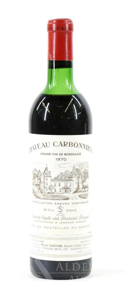 Chateau Carbonnieux Grand Vin De Bordeaux Wine 1970: Chateau Carbonnieux Grand Vin De Bordeaux, 1970. (1) bottle at 750 ml. Upper neck fill. This item is not available for shipping, pick up only.