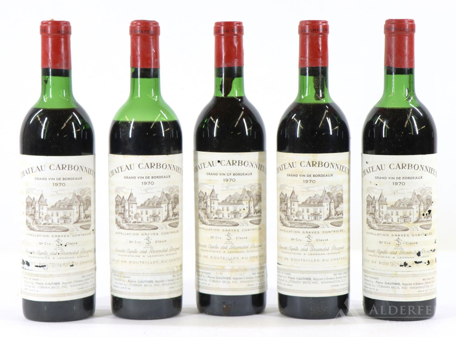 Chateau Carbonnieux Grand Vin De Bordeaux Wine 1970: Chateau Carbonnieux Grand Vin De Bordeaux, 1970. (5) bottles of wine at 750 ml. Mid-top fill, sediment in neck. This item is not available for shipping, pick up only.