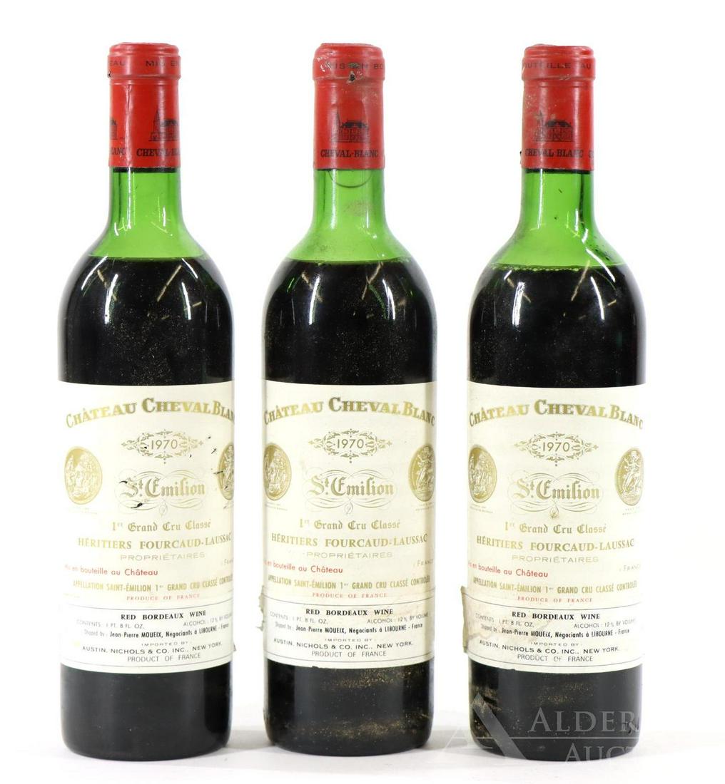 Chateau Cheval Blanc Heritiers Fourcaud-Laussac St.: Chateau Cheval Blanc Heritiers Fourcaud-Laussac St. Emilion, 1970. (3) bottles of wine at 750 ml. Upper shoulder fill. This item is not available for shipping, pick up only.