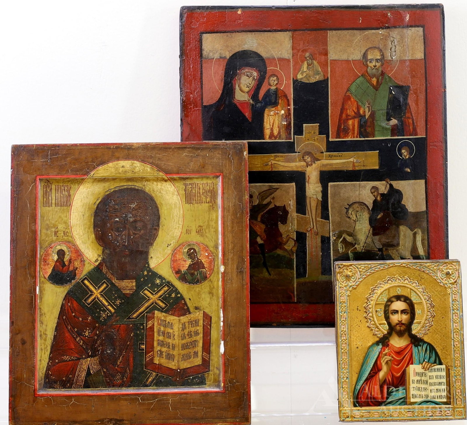 Russian Icons, Christ Pantocrator, St. Nicholas, &: Tempera on gesso on panel of a central Crucifix surrounded by panels depicting Archangel Michael, St. George and the dragon, St. Nicholas the Wondermaker, and Theotokos Mother and Child. 14.