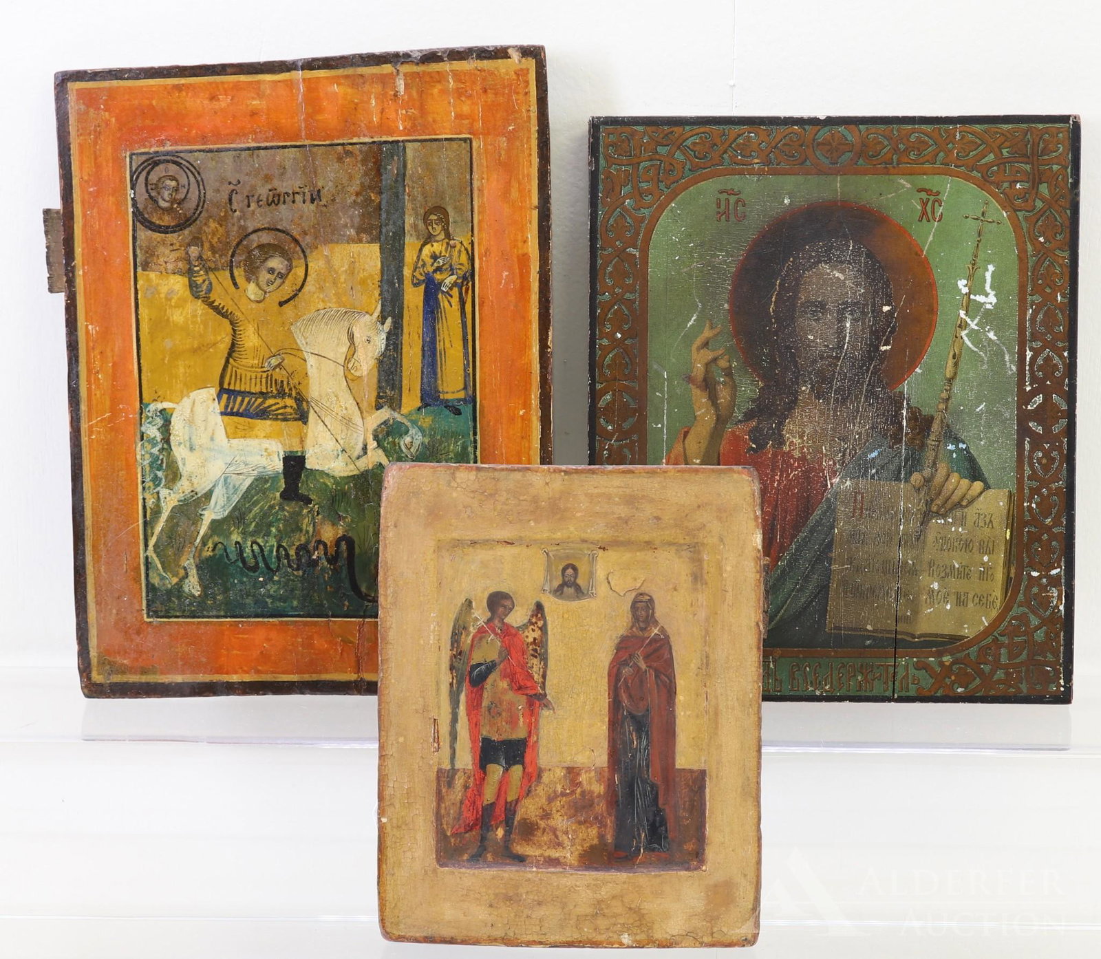 Russian Icons, St. George, Annunciation, & Christ: Tempera on gesso on panel. St. George Slaying the Dragon, with old stamps and labels en verso. 11.5"h x 8.5"w. Annunciation with Archangel Gabriel and Virgin Mary. 8.25" x 6.5"; Christ Pantocrator / C