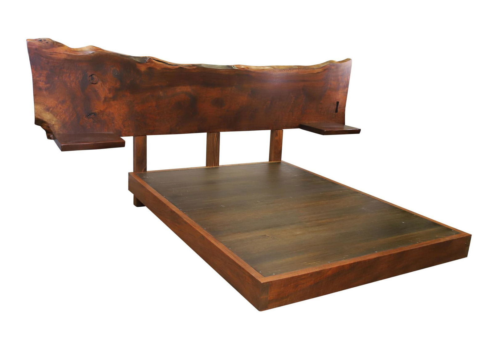 Figured Black Walnut Live Edge Platform Bed: Handcrafted custom design. Headboard consisting of free form edge with butterfly tenons and flanking suspended night stands, Approx 55"h x 120"w x 19"d. Dovetail walnut and cherry California king size