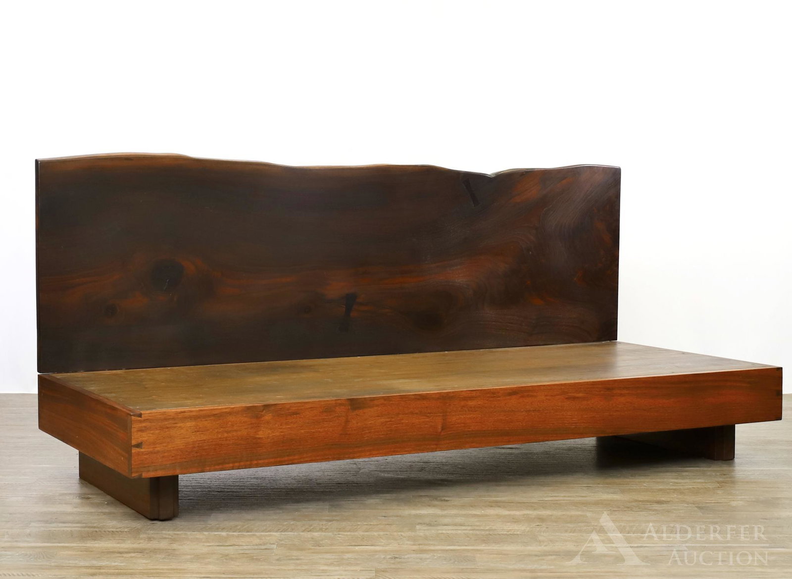 Figured Black Walnut Live Edge Day Bed: Handcrafted custom design. Back having a free form edge with dovetail and butterfly tenon construction and a walnut and cherry platform bed. Lot includes complimentary mattress. 34"h x 77"w x 32"d **P