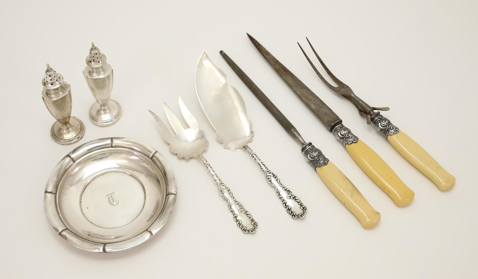 Sterling Silver Hollowware, Fish & Carving Sets: Wallace "Waverly" fish serving knife and fork, carving knife, fork, and sharpener with repousse sterling ferrules and faux bone handles, J.E. Caldwell bonbon bowl with lobed rim and monogram, and a pa