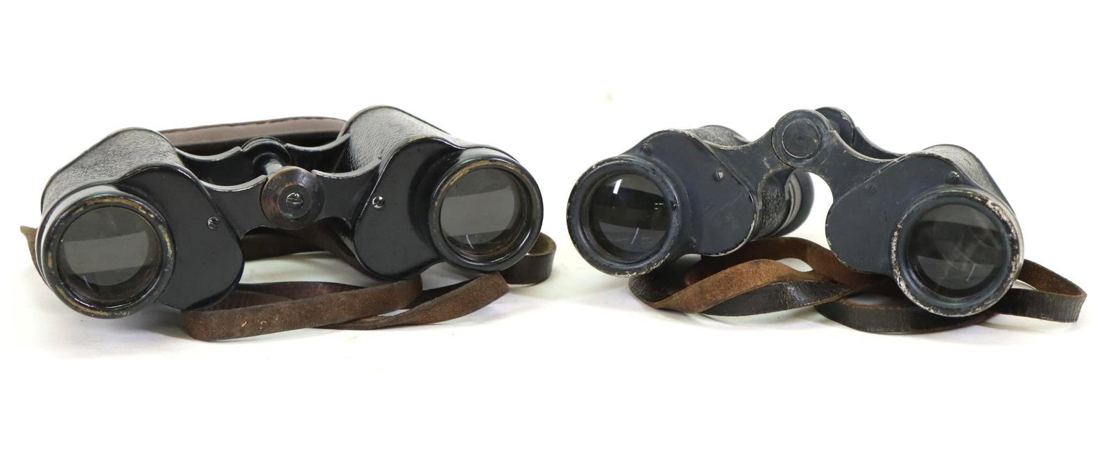 Pair of World War II Period Binoculars: Pair of World War II period binoculars including; 1.) German binoculars marked "DIENSTGLAS, 6X30, 117105, BMK". Binoculars exhibit some slight chipping to paint, dryness to leather neck strap and exhi