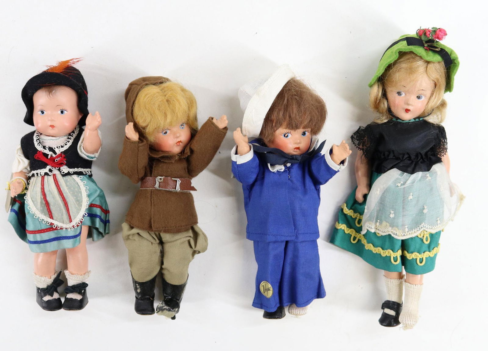 LOT Of COMPOSITION.: Lot of (4) dolls with painted features, dressed in original outfits. 7 1/2" Tagged 1938 EFFANBEE "Patsy Tinyette" with painted hair. Dressed as a Tyrolean Girl with original shoes. The balance of thes