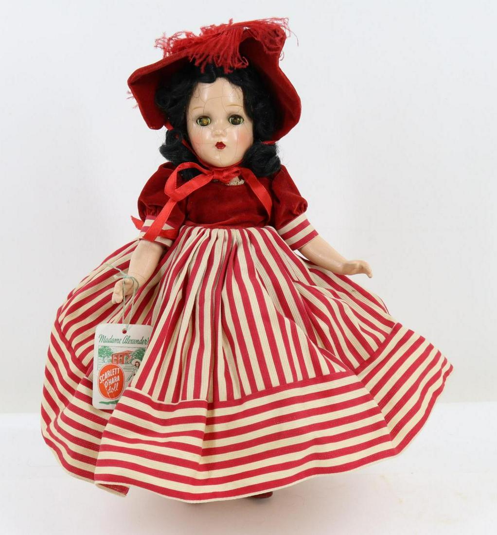 LOT OF COMPOSITION.: 14 1/2" 1937 MADAME ALEXANDER tagged "Scarlett O'Hara" doll. Sleep eyes, closed mouth, black curled mohair wig. Dressed in factory original red/white stripe cotton dress with red velveteen bodice, att