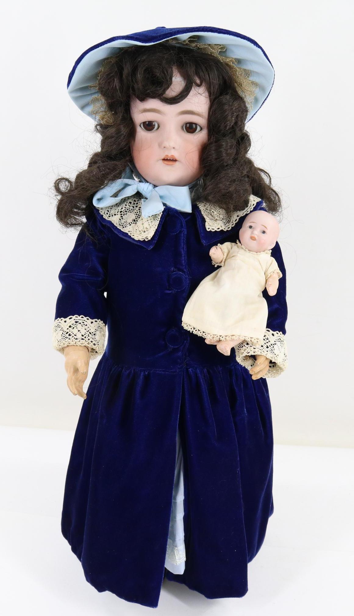 ANTIQUE BISQUE HEAD DOLL(S). (1 of 12)