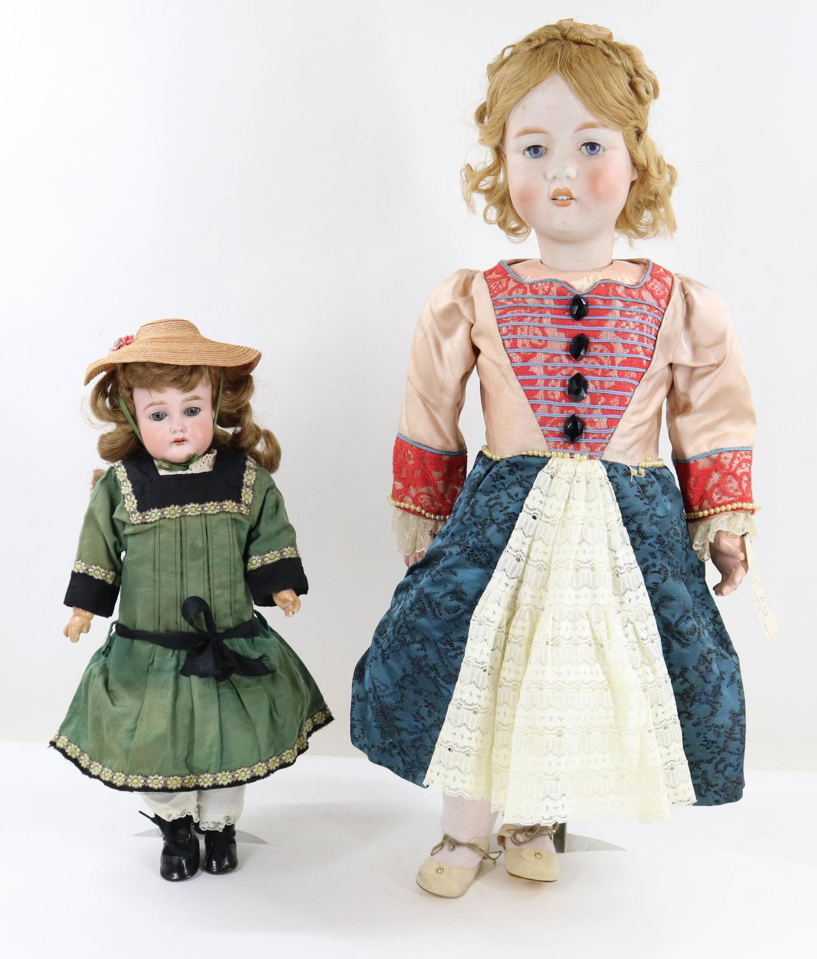 ANTIQUE BISQUE HEAD DOLL(S). (1 of 20)