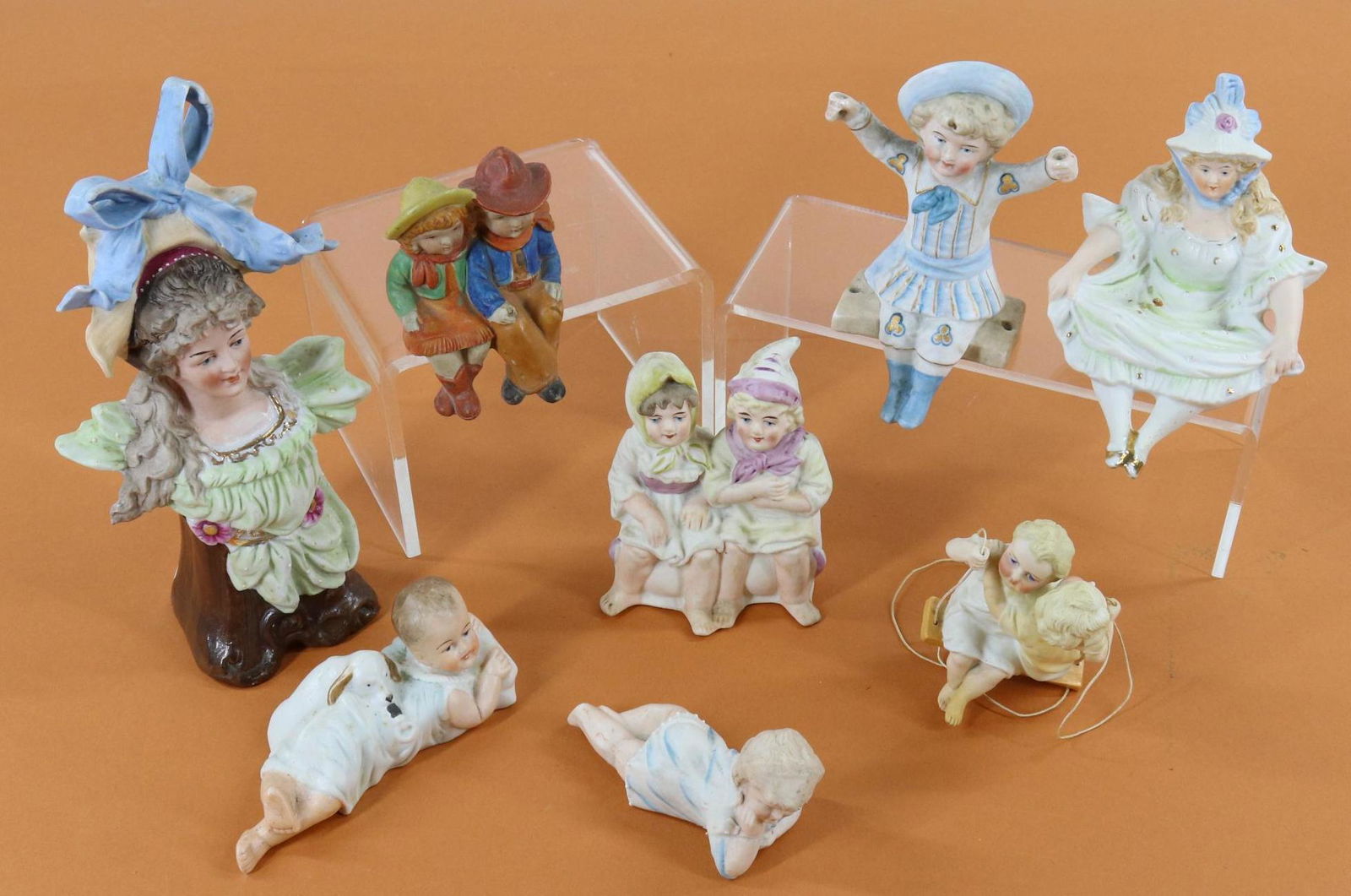 LOT OF BISQUE/CHINA FIGURINES. (1 of 16)
