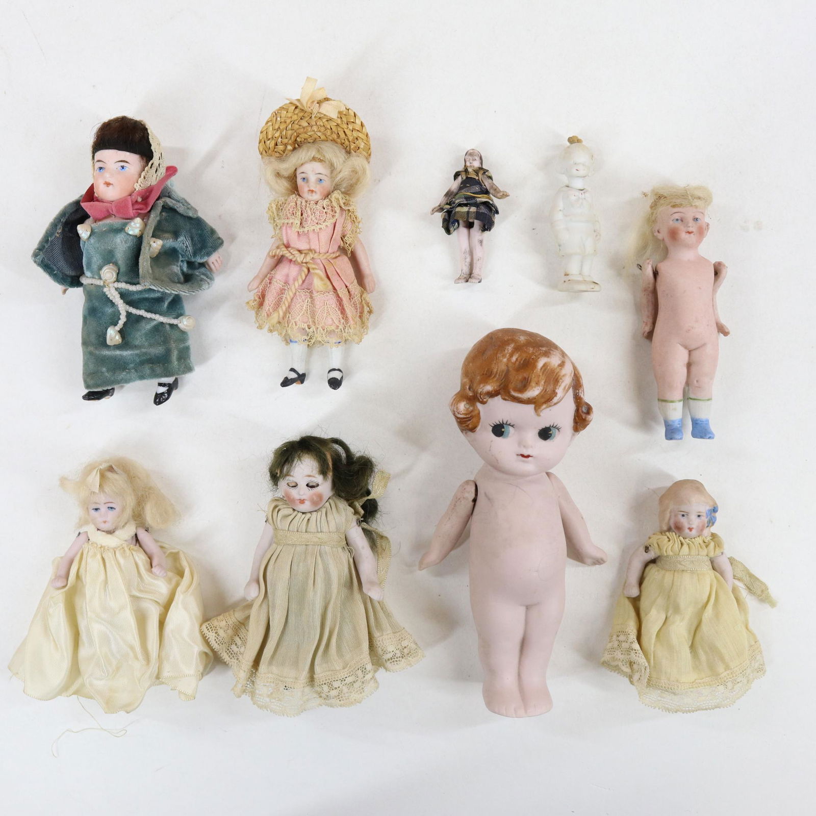 LOT OF ALL BISQUE DOLLS. (1 of 14)