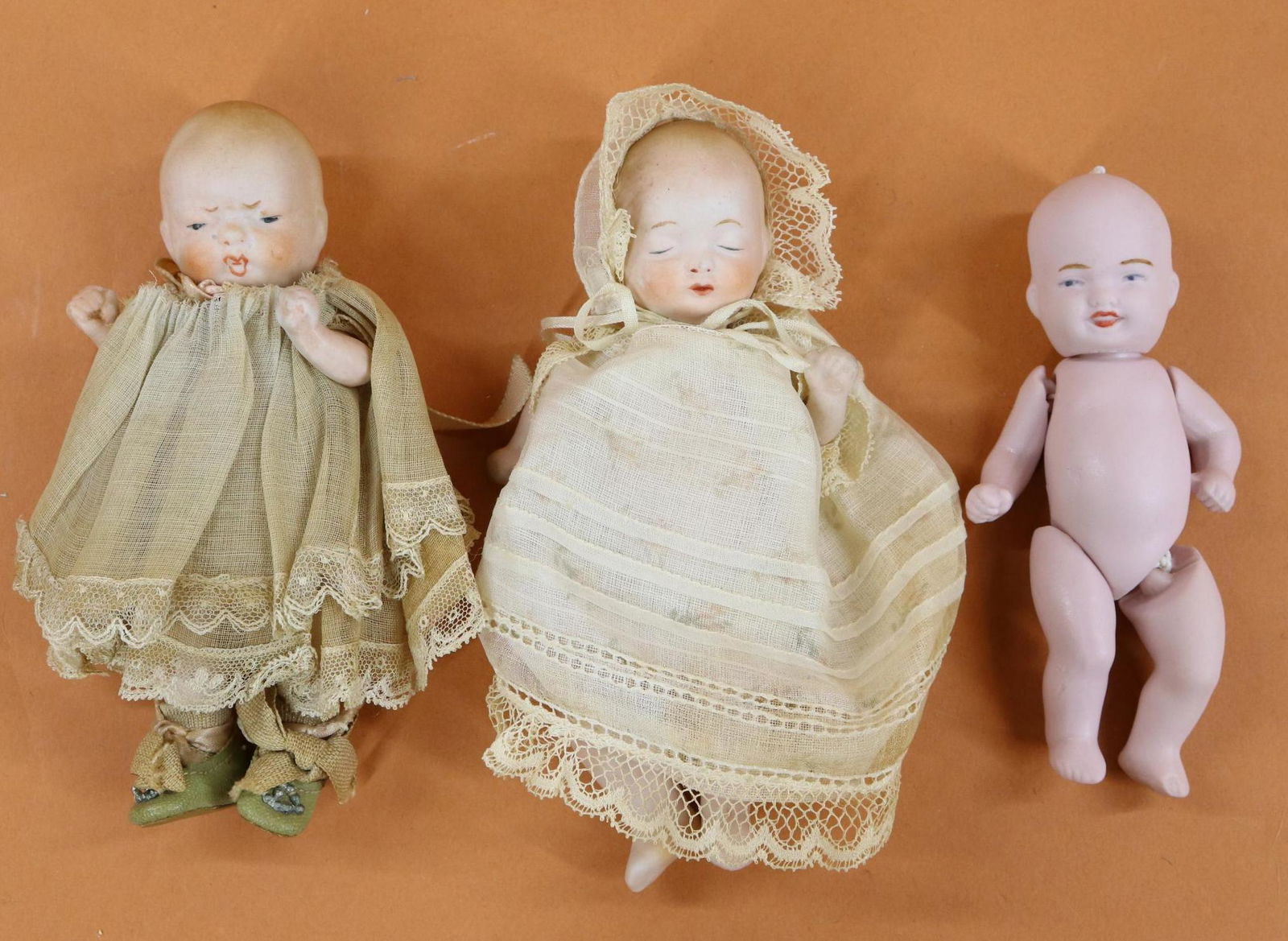 LOT OF ALL BISQUE DOLLS. (1 of 10)