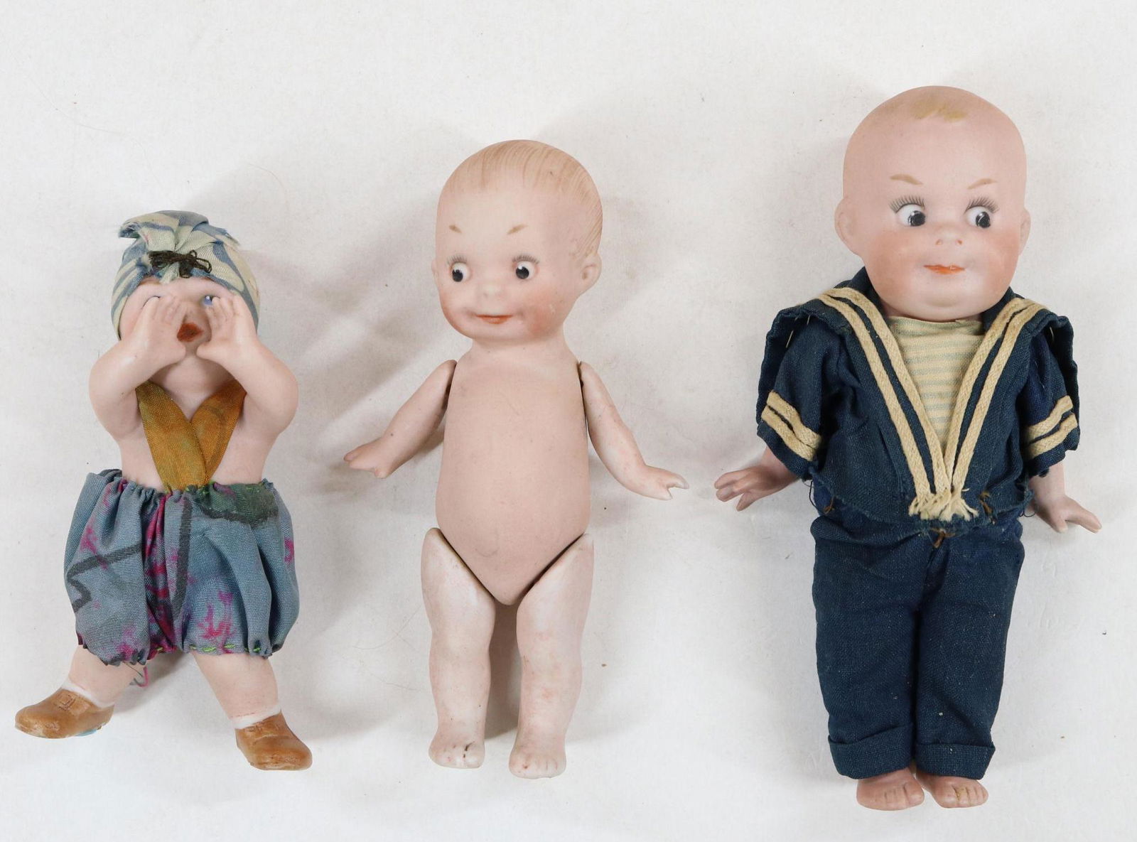 LOT OF ALL BISQUE DOLLS. (1 of 6)