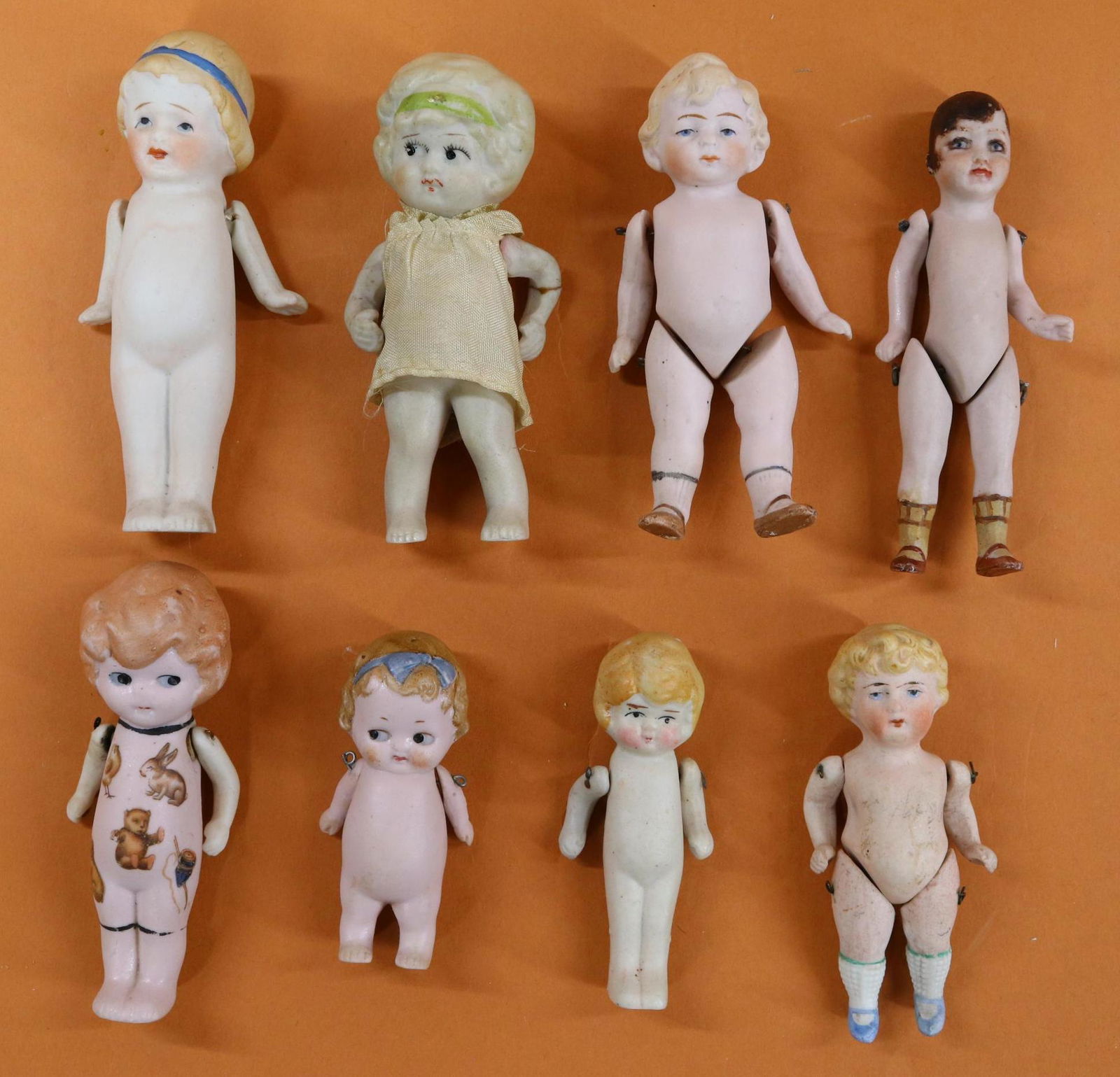 LOT OF ALL BISQUE DOLLS. (1 of 10)