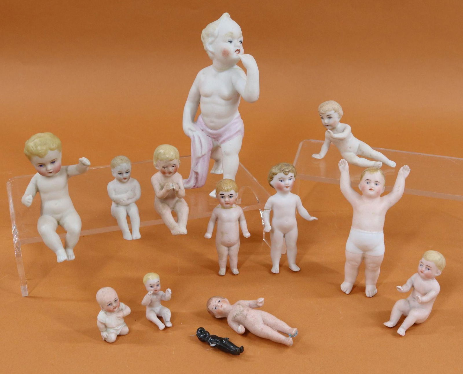 LOT OF ALL BISQUE DOLLS. (1 of 14)