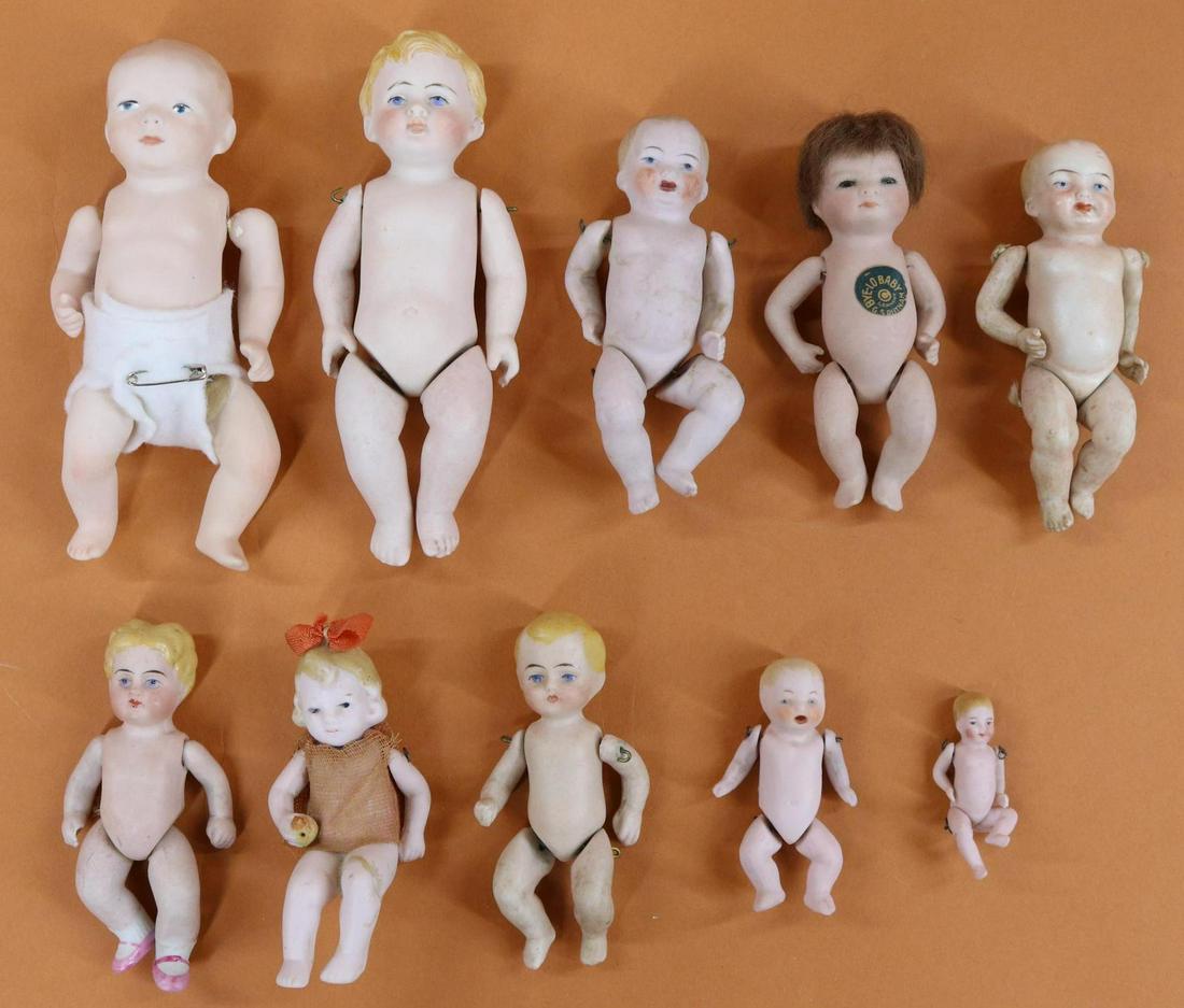 LOT OF ALL BISQUE DOLLS. (1 of 7)