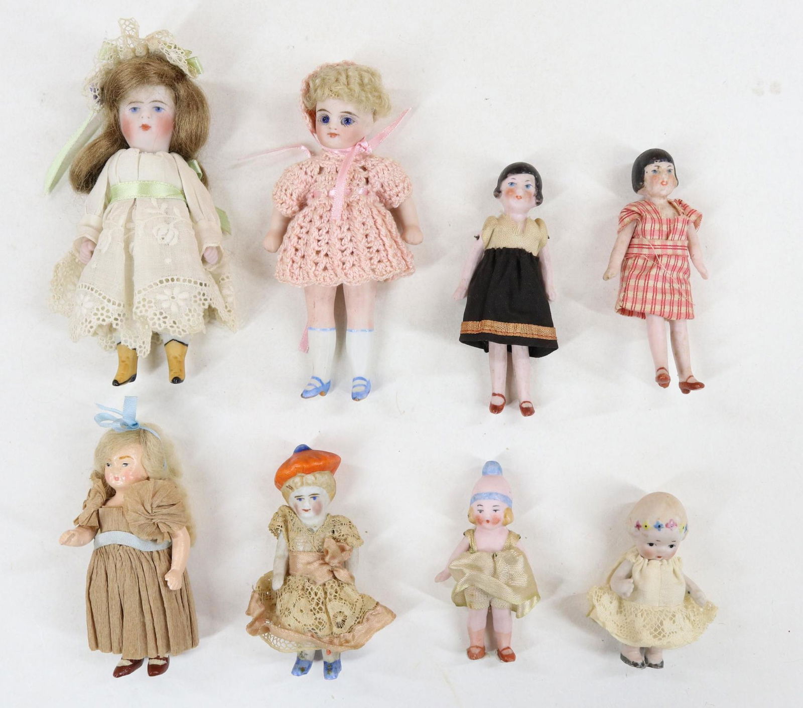 LOT OF ALL BISQUE DOLLS. (1 of 10)