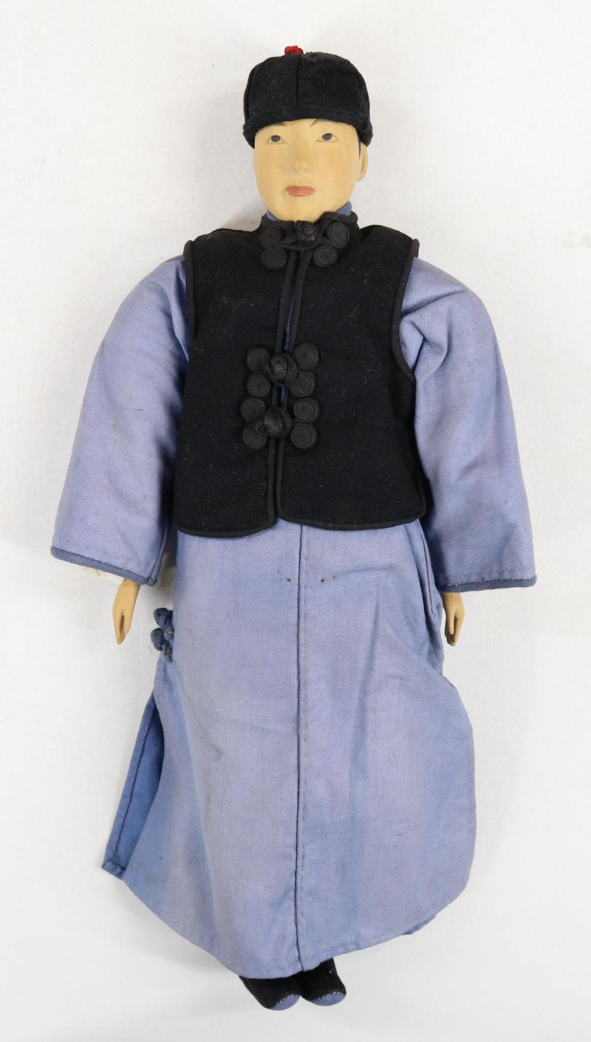 DOOR OF HOPE.: 11" "Table Boy" doll. Painted black hair. He is wearing his black silk skull cap. Black silk shoes. Carved hands. Condition: age discoloration, fading on clothing.