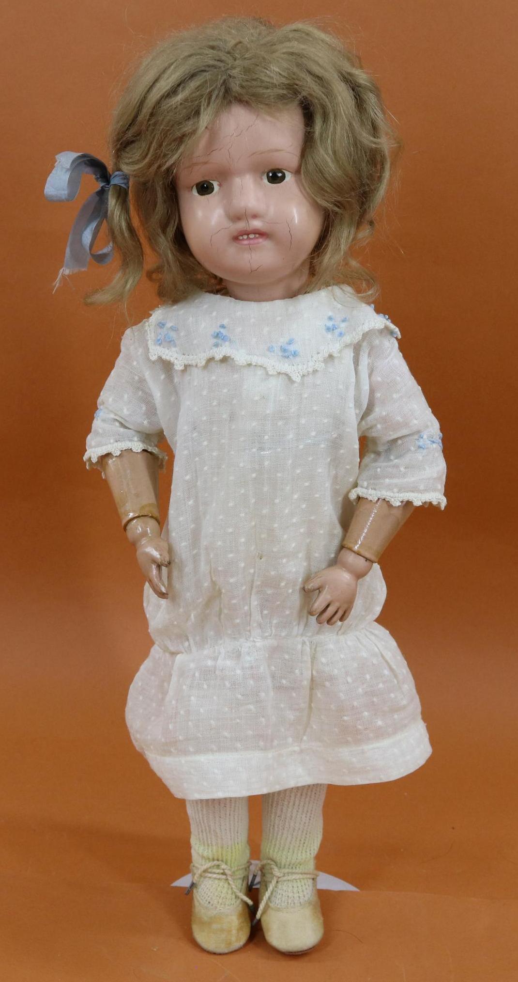 SCHOENHUT LOT.: 15" Model 316 "Miss Dolly" doll with painted brown eyes, tosca mohair wig. Closed mouth with teeth showing. Marked with oval decal on back of torso. Original factory chemise but no other original clot