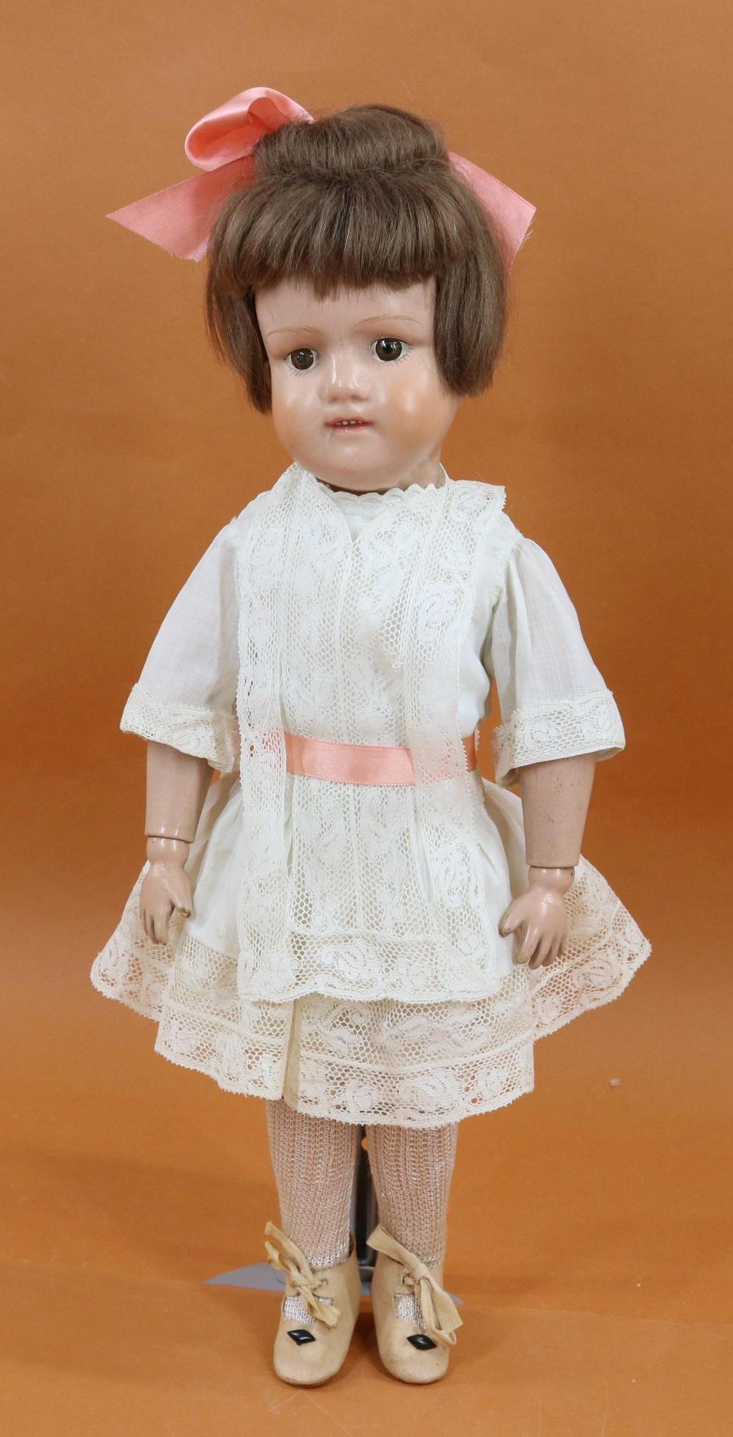 SCHOENHUT LOT.: 15" Model 316 "Miss Dolly" doll with painted brown eyes, brown mohair wig. Closed mouth with teeth showing Incised mark on back of torso. Original factory chemise but no other original clothing. Dress