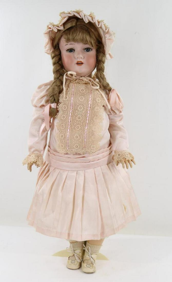 GERMAN BISQUE HEAD DOLL.: 29" ARMAND MARSEILLE GERMANY 390 A.13.M. Doll with blue sleep eyes, fluffy lashes, open mouth, dimple in chin, honey blonde braided synthetic wig. Papier mache ball jointed body. Dressed in vintage pa