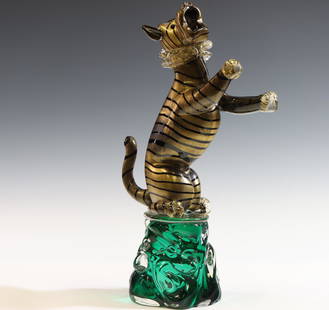 Murano Art Glass Tiger: Italian blown glass gold aventurine rampant tiger sculpture on a green tinted base, labeled. 16"h x 5"w x 10"d **Please Note: This item is NOT eligible for in-house shipping. Please refer to the