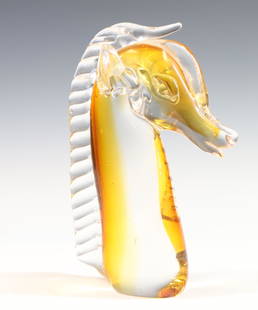 Murano Art Glass Horse Head: Italian blown glass amber tinted horse head. 10"h x 3.5"w x 7"d **Please Note: This item is NOT eligible for in-house shipping. Please refer to the terms and conditions of this auction for recommended