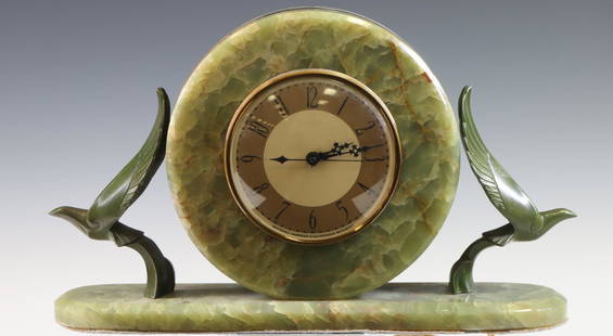 Whitehall Hammond Synchronous Movement Clock: Art Deco onyx mantel clock with faux bronze eagles, c. 1930. An eagle has been repaired. 9.75"h x 15.5"w x 3.5"d **Please Note: This item is NOT eligible for in-house shipping. Please refer to the