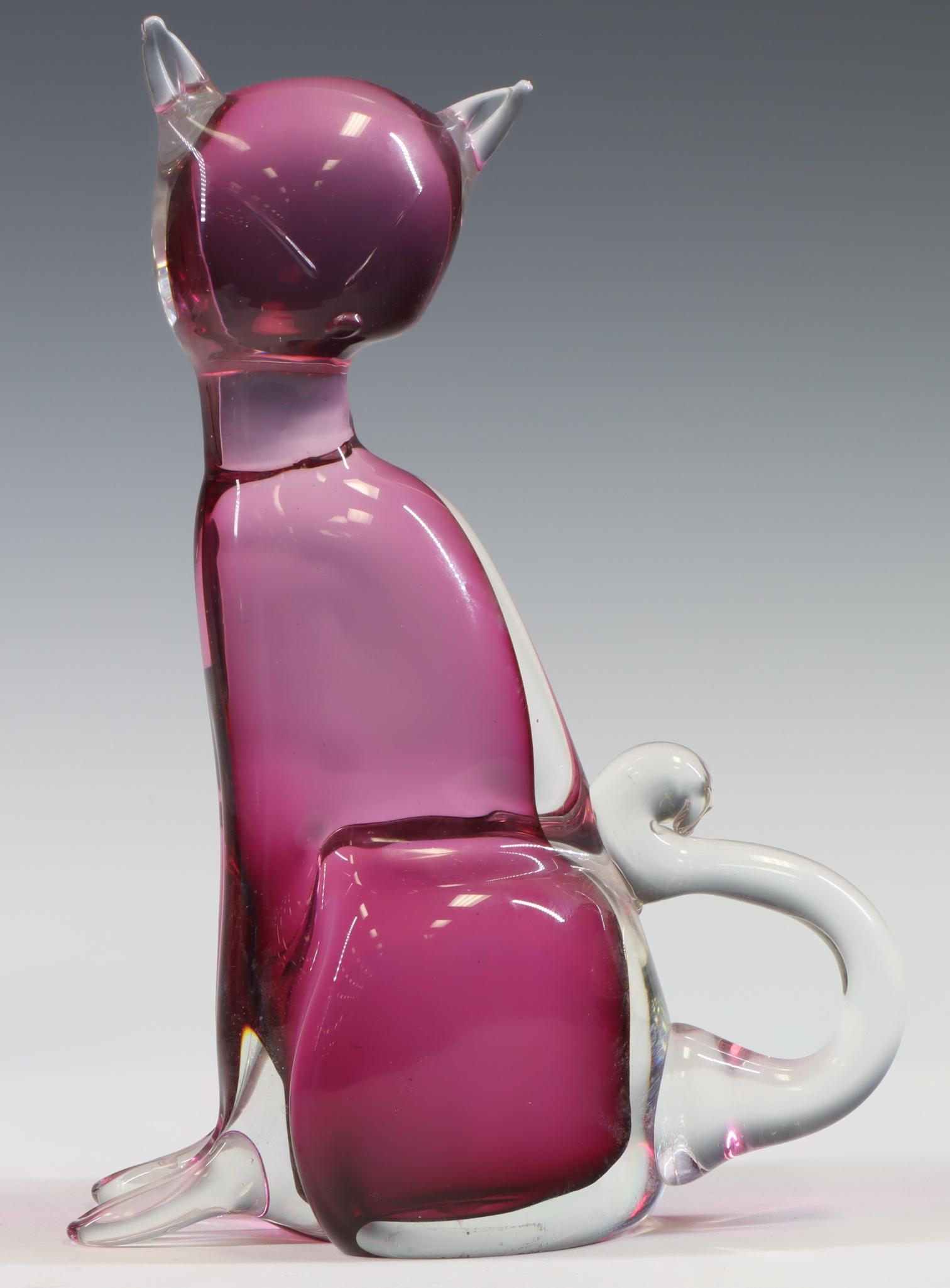 Murano Art Glass Cat: Italian blown glass cranberry sommerso cat, in the manner of Alfredo Barbini. 9.5”h x 3.5”w x 6.5”d **Please Note: This item is NOT eligible for in-house shipping. Please refer to th