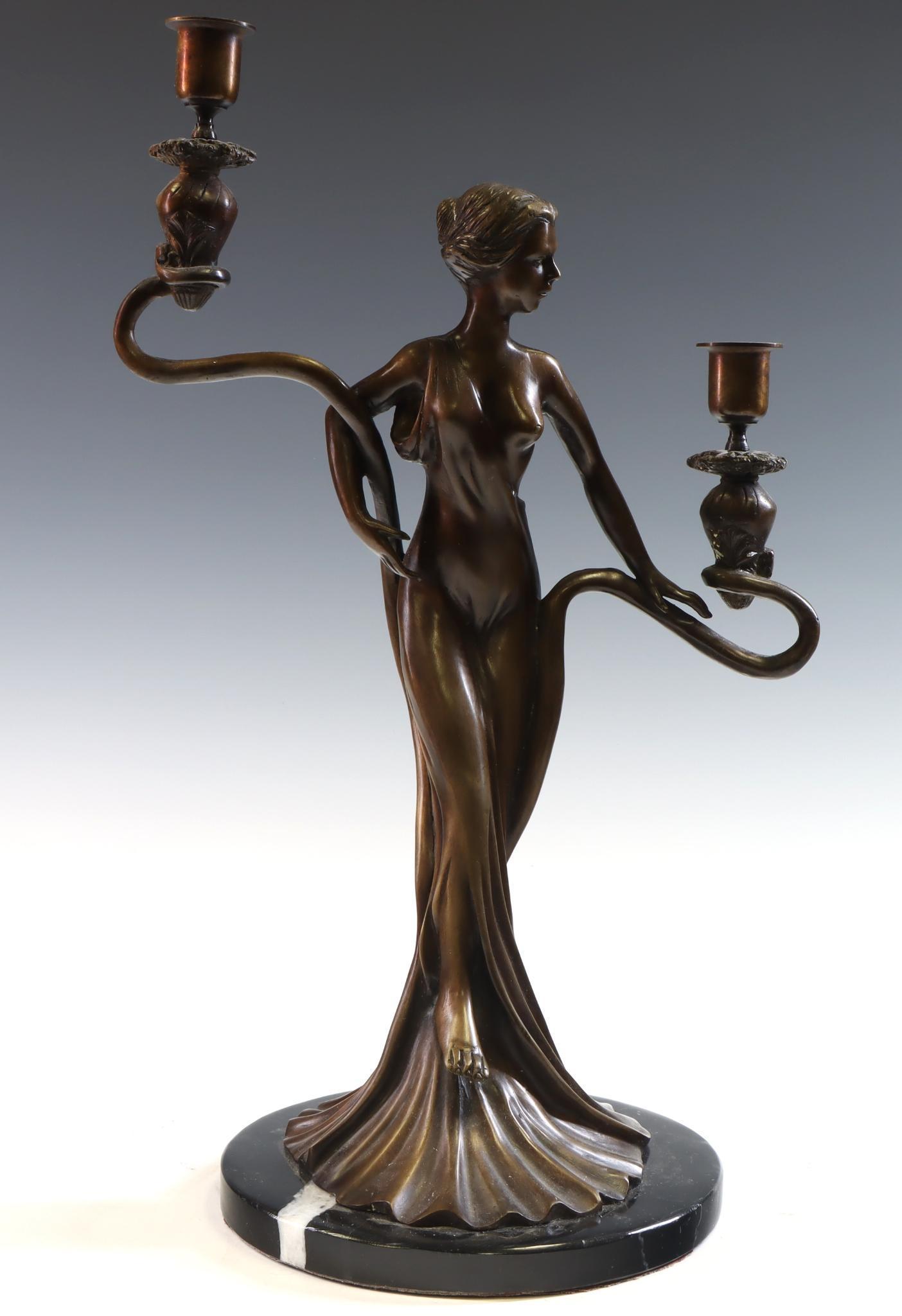 After Louis Ernest Barrias (1841-1905): Art Nouveau bronze semi-nude female 2-light candelabra on marble base, after Louis Ernest Barrias. 17.5"h x 11"w **Please Note: This item is NOT eligible for in-house shipping. Please refer to the ter