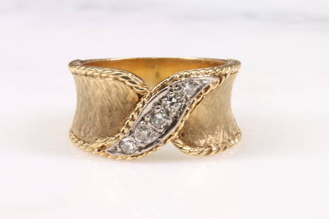 14KY Gold Diamond Ring: Polished band features a "saddle" of brushed gold with rope edging and round diamonds, (5) approx. .30ctw. 11mm wide, size 8. 8.3gtw