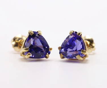 14KY Gold Tanzanite Earrings: Studs feature trillion cut tanzanite in basket settings with double prong tips. Threaded posts with nuts, screw back pierced. 7mm. 1.7gtw