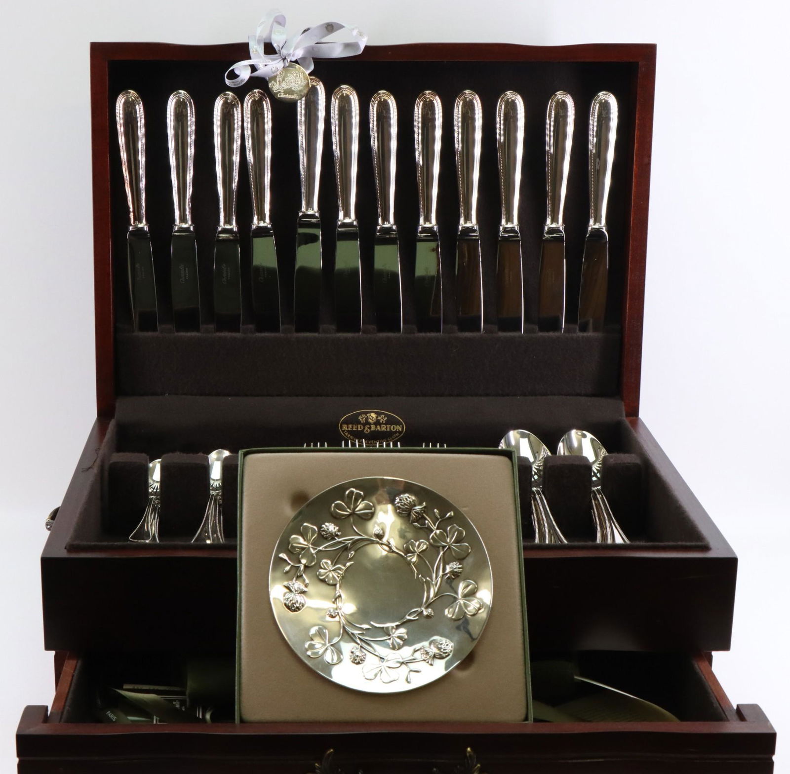 Christofle "Perles" Flatware Service for 12 and "Trefles" Bowl: Dinner forks (8"), hollow handle knives, place spoons, and teaspoons, with original silver bags, and ribbon with seal and medallion. Knives 9.5". (48) pieces. "Trefles" bowl, Bouilhet-Christofle Museu
