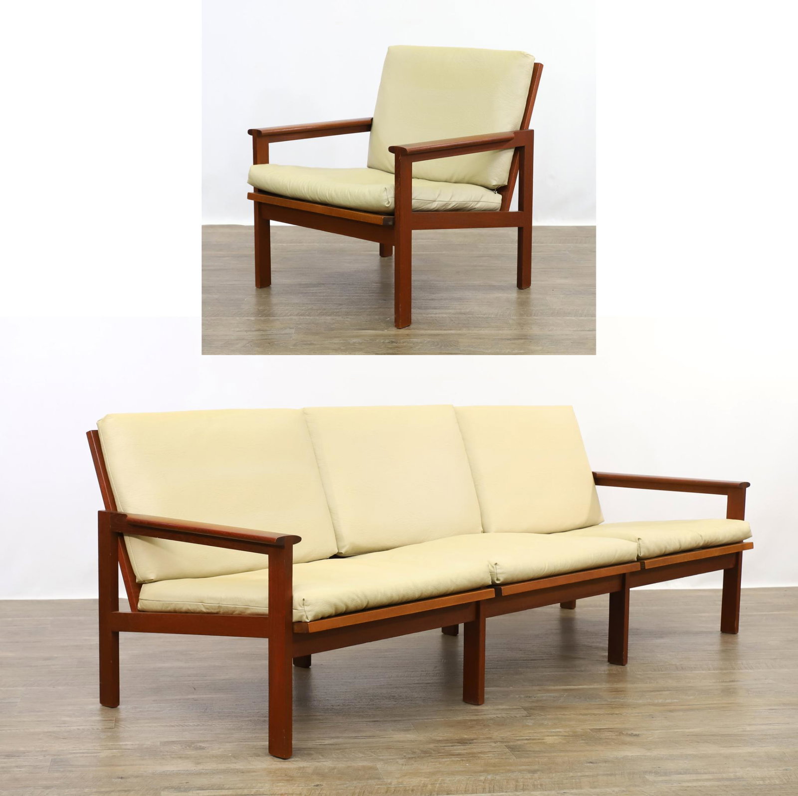 Danish Mid-Century Modern Teak Sofa and Armchair: Sofa and chair having a linear form with ladder backs, straight arms and legs, cowhide strap seats with beige vinyl upholstery. 28"h x 74"w x 27"d, 14" seat height. Chair, 28"h x 26.5"w x 26"d, 14" se